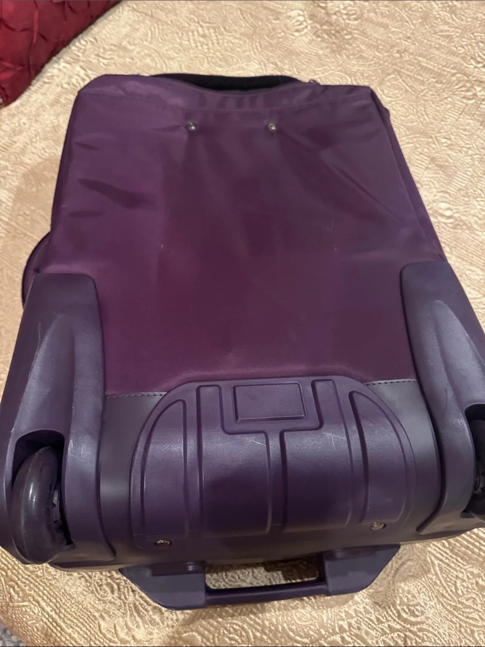 Lipault Men or Wonen’s Rolling Duffel in Deep Plum